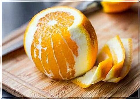 Peeled orange for wild herb and fruit salad