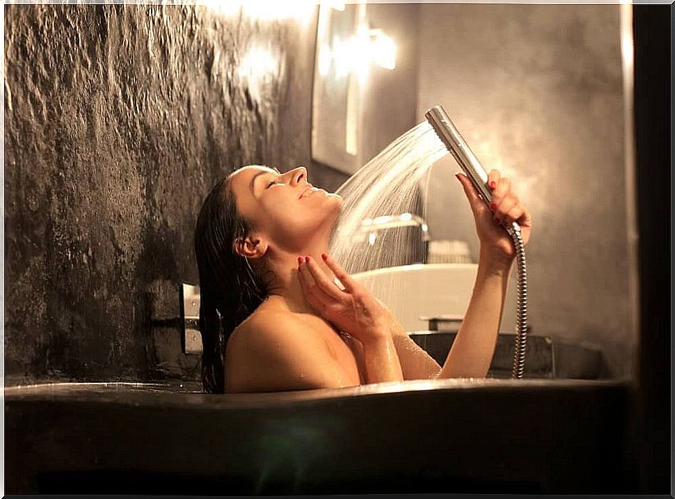 Woman taking a spa bath at home.