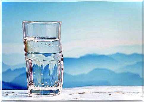 Mineral water against mountain landscape